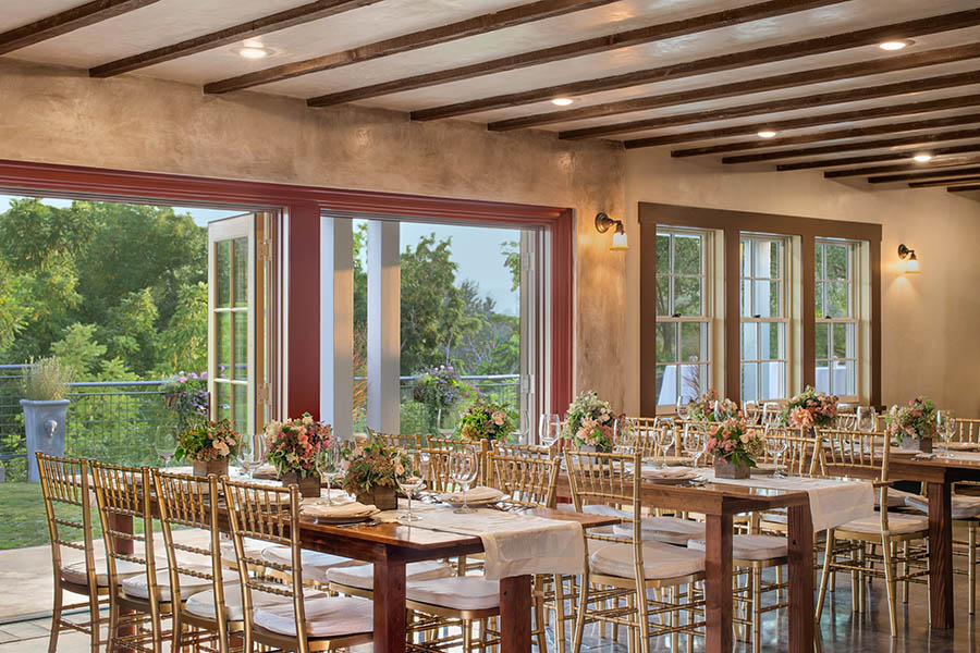 Tables set by patio doors